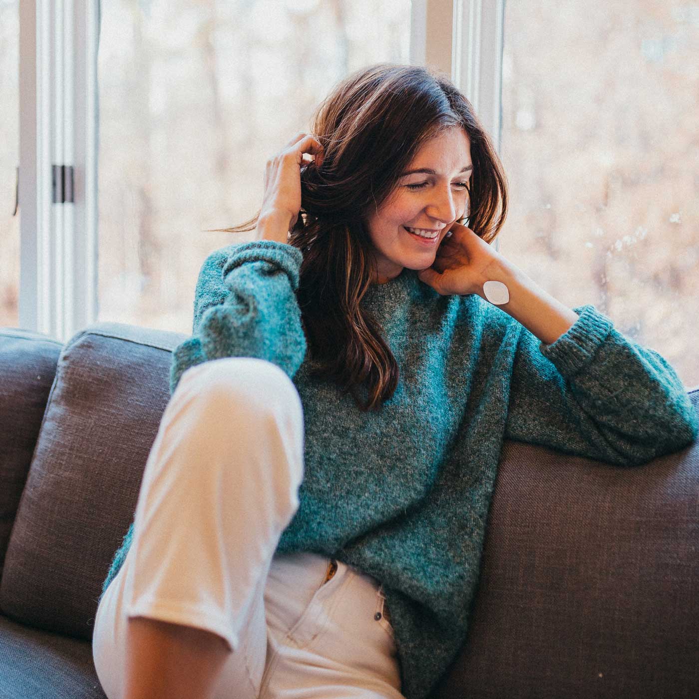 Happy woman wearing Breatherapy patch